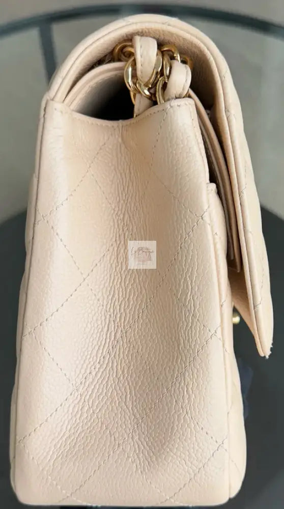 Torebka Chanel classic jumbo beige caviar/gold 2011r.