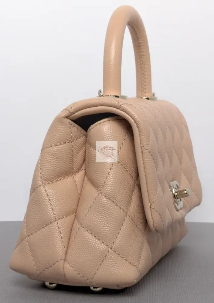 Torebka Chanel Coco Handle mini pink beige/gold hdw caviar