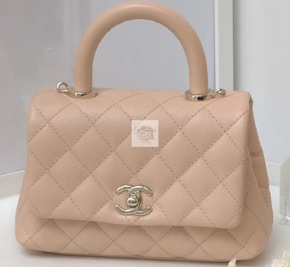 Torebka Chanel Coco Handle mini pink beige/gold hdw caviar