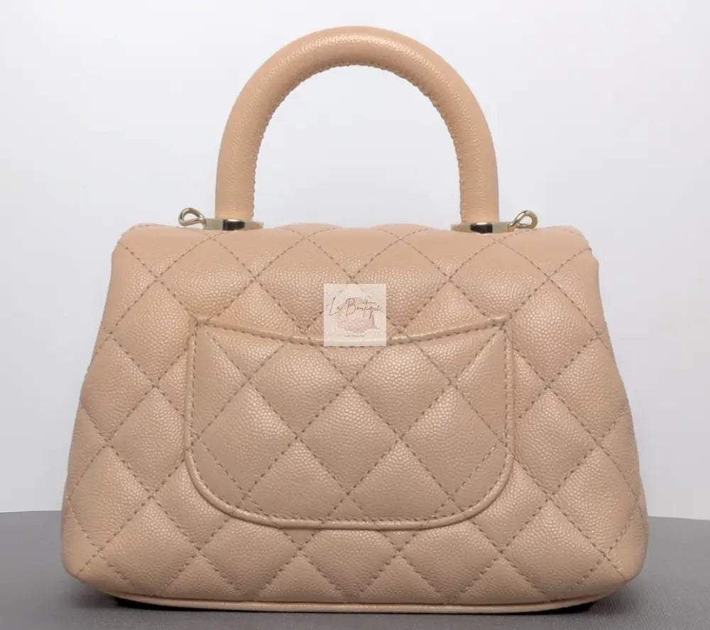 Torebka Chanel Coco Handle mini pink beige/gold hdw caviar