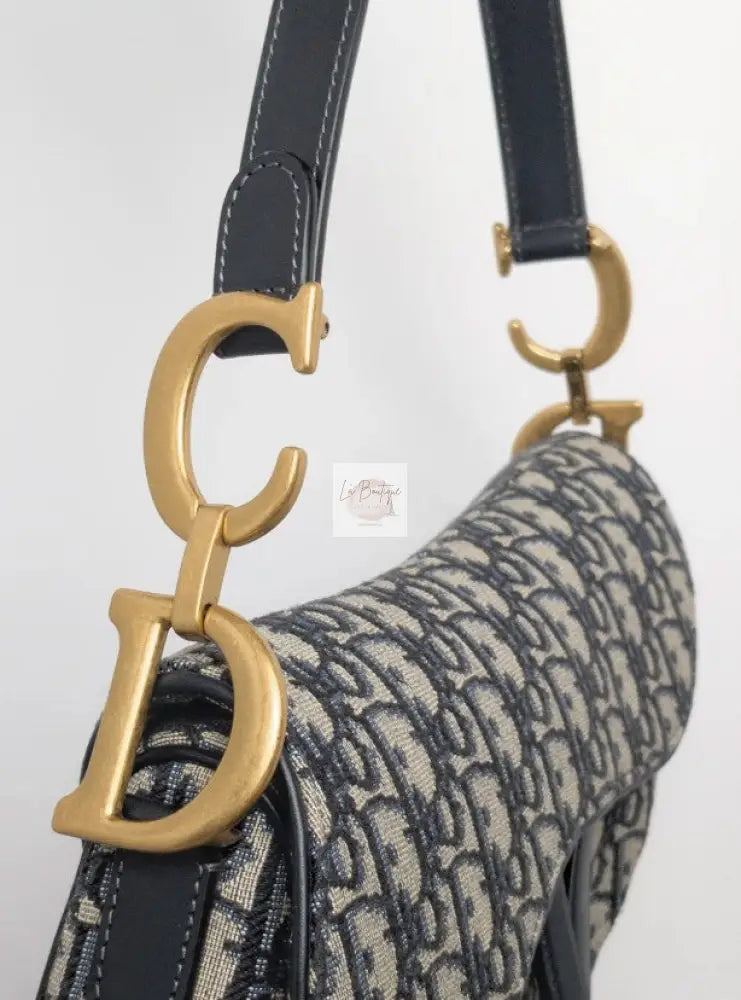 Torebka Dior Saddle medium Blue Oblique Jacquard Fabric/brushed gold