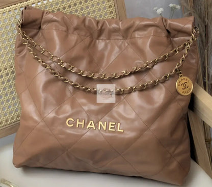Torebka Chanel 22 medium caramel/gold nowa