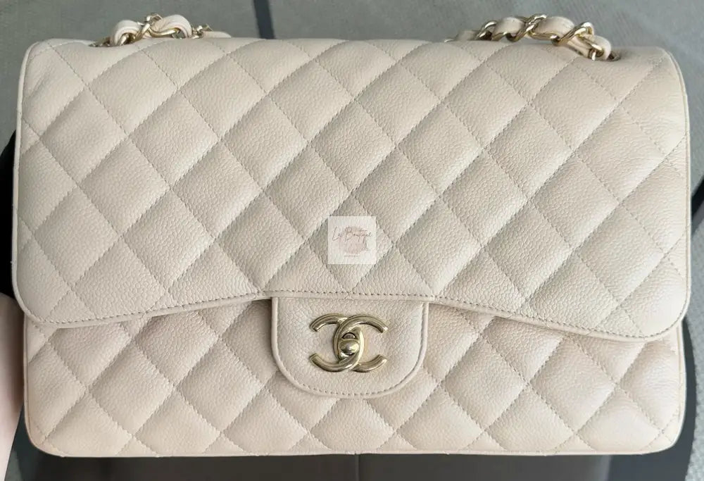 Torebka Chanel classic jumbo beige caviar/gold 2011r.