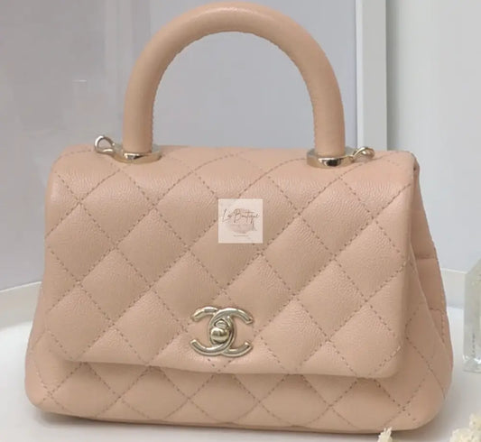 Torebka Chanel Coco Handle mini pink beige/gold hdw caviar