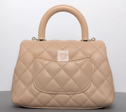Torebka Chanel Coco Handle mini pink beige/gold hdw caviar