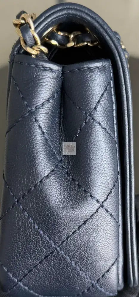 Torebka Chanel Mademoiselle small dark blue gold hdw seria 23